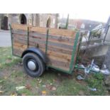 A livestock/sheep trailer with iron and timber slatted frame, the main body approx 2 metres long x 1