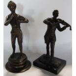 A bronze statue of a violinist, signed Milo, raised on a black marble plinth, 20cm tall, and a