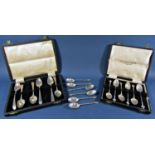 a cased set of six Georgian teaspoons, a cased set of six silver teaspoons with shell bowls,