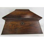 A large Regency rosewood sarcophagus tea caddy, with a well fitted interior mixing bowl (not