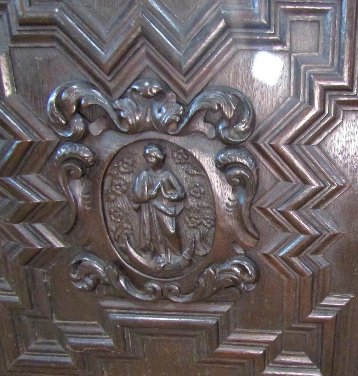 A substantial 19th century oak side cupboard enclosed by a pair of panelled doors, oval portrait - Image 3 of 4