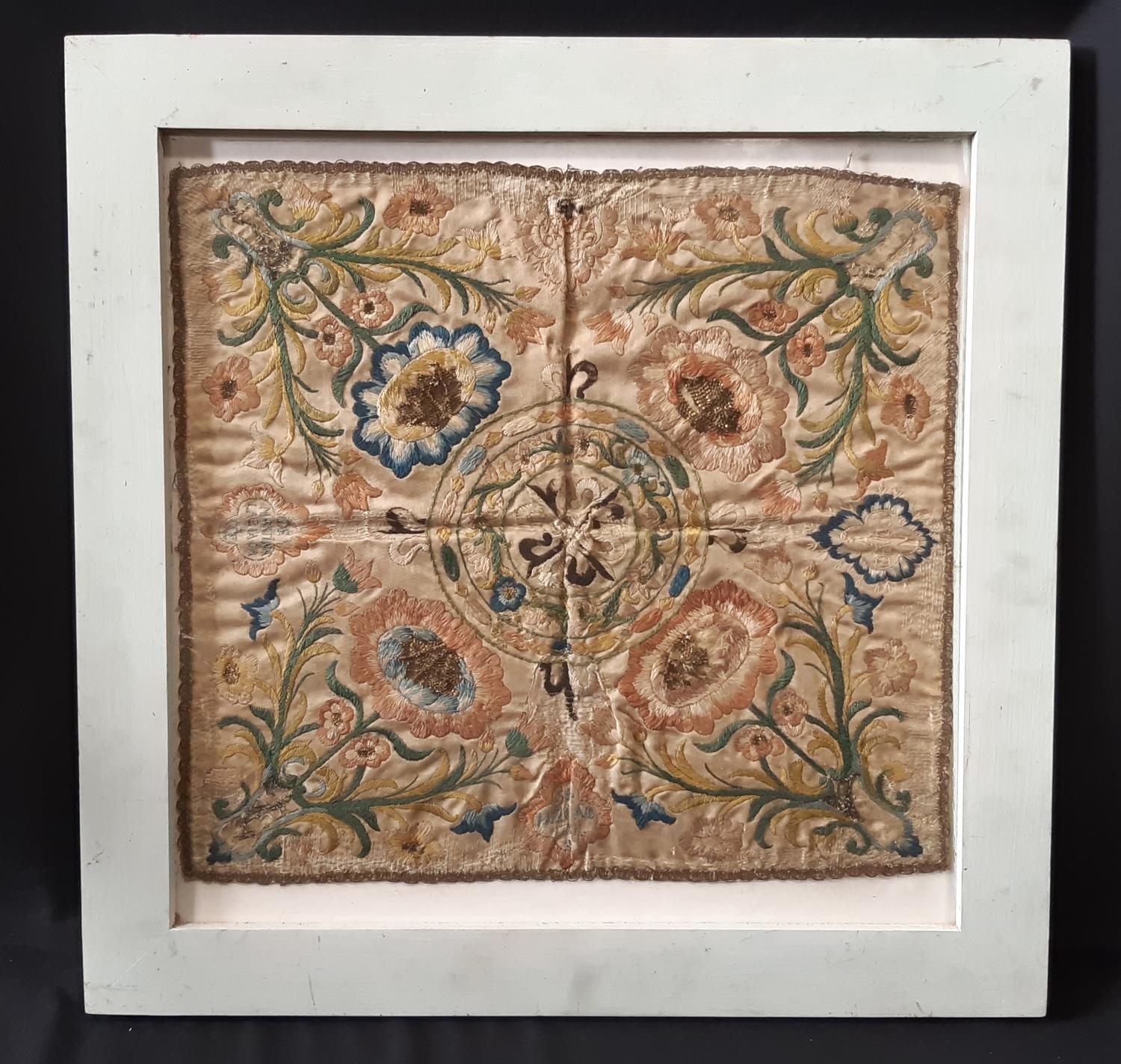 18th century Spanish embroidered silk panel with a floral design in satin stich arranged in