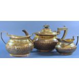 A silver three piece tea service, teapot, jug and bowl, all makers marks rubbed, 18.4oz all in