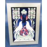 Framed Moorcroft panel in the art nouveau style showing two doves and floral detail, dated 2014