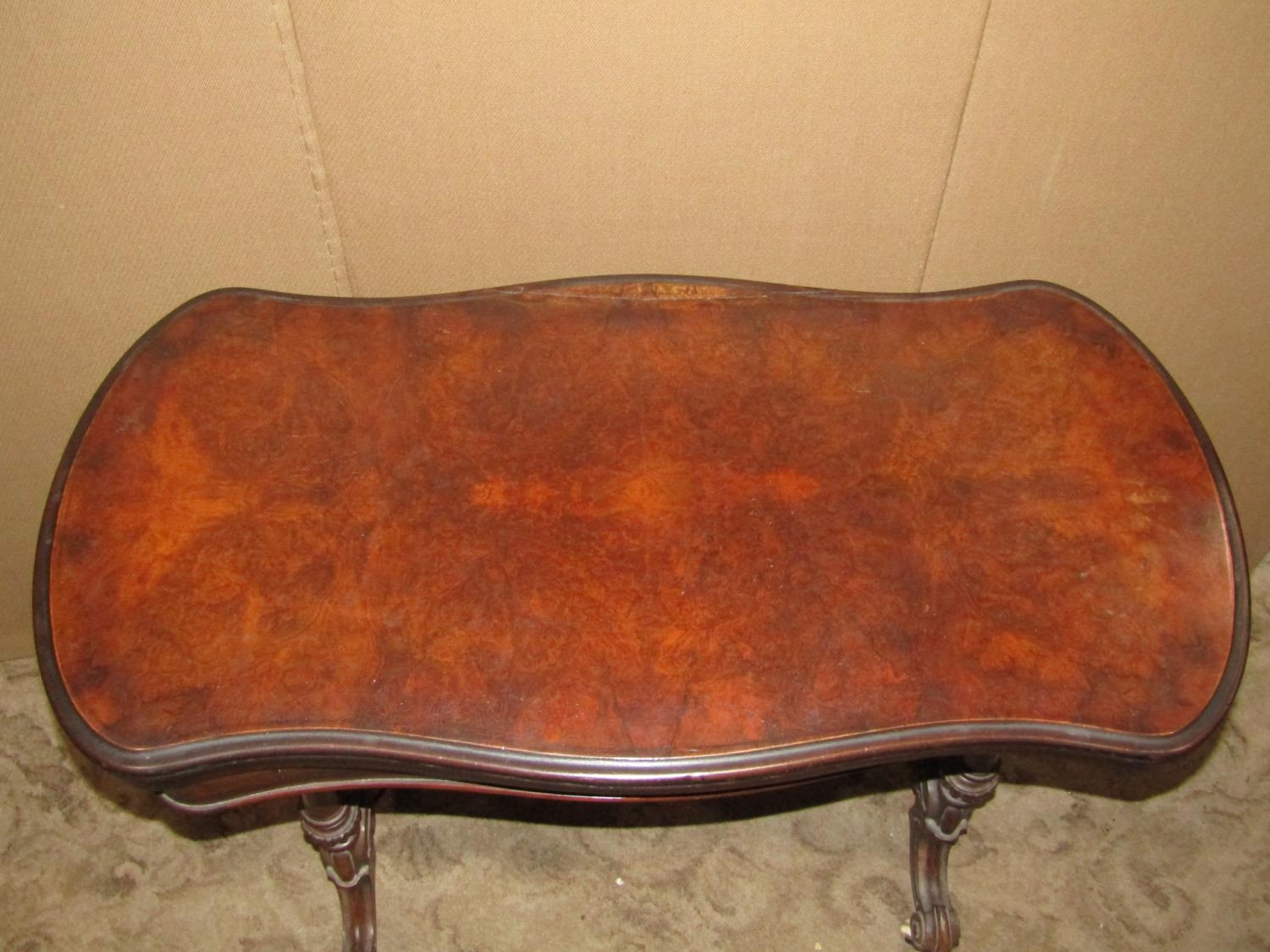 A walnut and figured walnut veneered fold over top card table with serpentine outline, raised on - Image 2 of 4