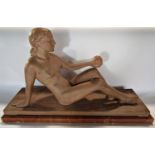 DAMAGED DURING VIEW - Lucien Charles Eduoard Alliot , 1877-1967, a terracotta figure of a reclining