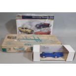 3 boxed models; Mustang Muscle Trio by Revell 1:24 scale, a 'Bluebird 1933' model racing car 1:43