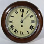 A small dial clock with oak case, chrome bezel and eight day time piece, the dial 19cm diameter