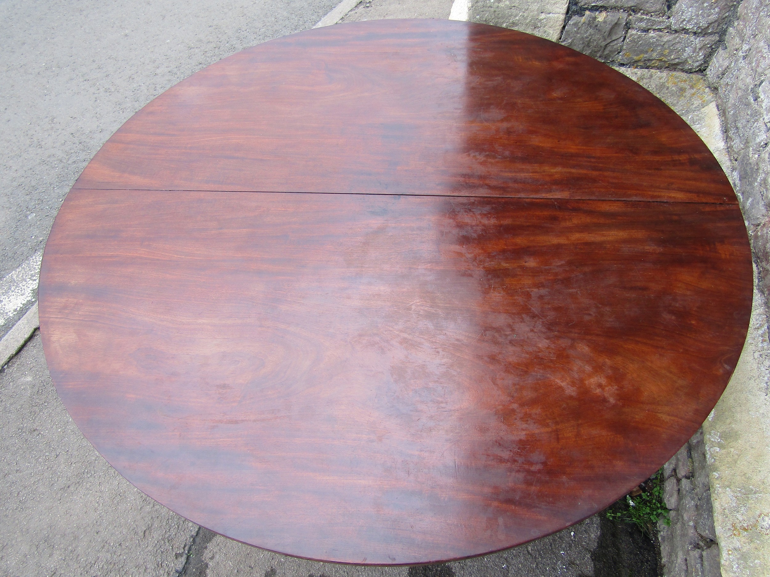 A Victorian mahogany breakfast table of circular form raised on a hexagonal pillar, tricorn - Image 2 of 3