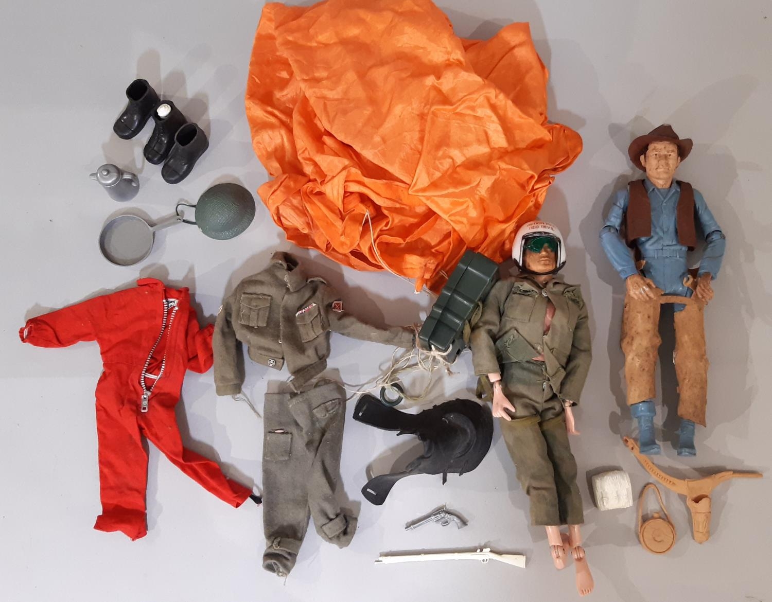 Vintage Action Man doll ©1964 with parachute and other accessories, together with a 'Johnny West'