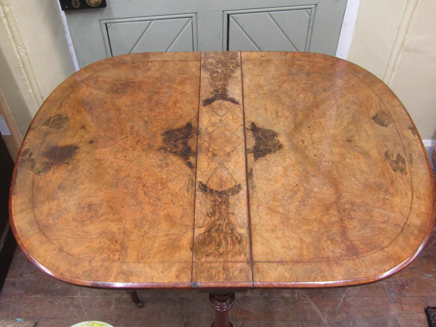 A Victorian figured walnut Sutherland tea table on carved supports, the top with simple inlaid - Image 2 of 2