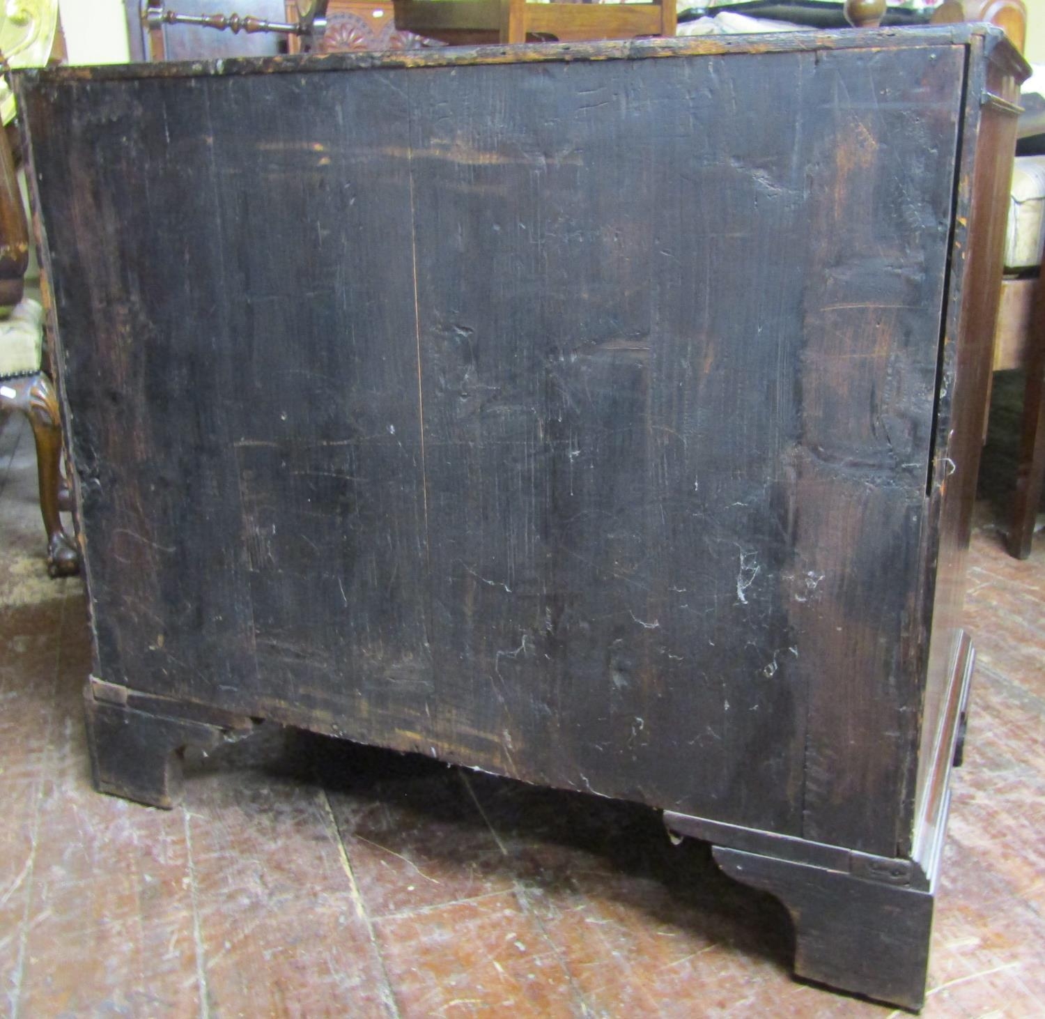 A Georgian mahogany and oak lined chest of four long graduated drawers enclosing a brush slide, - Image 3 of 4