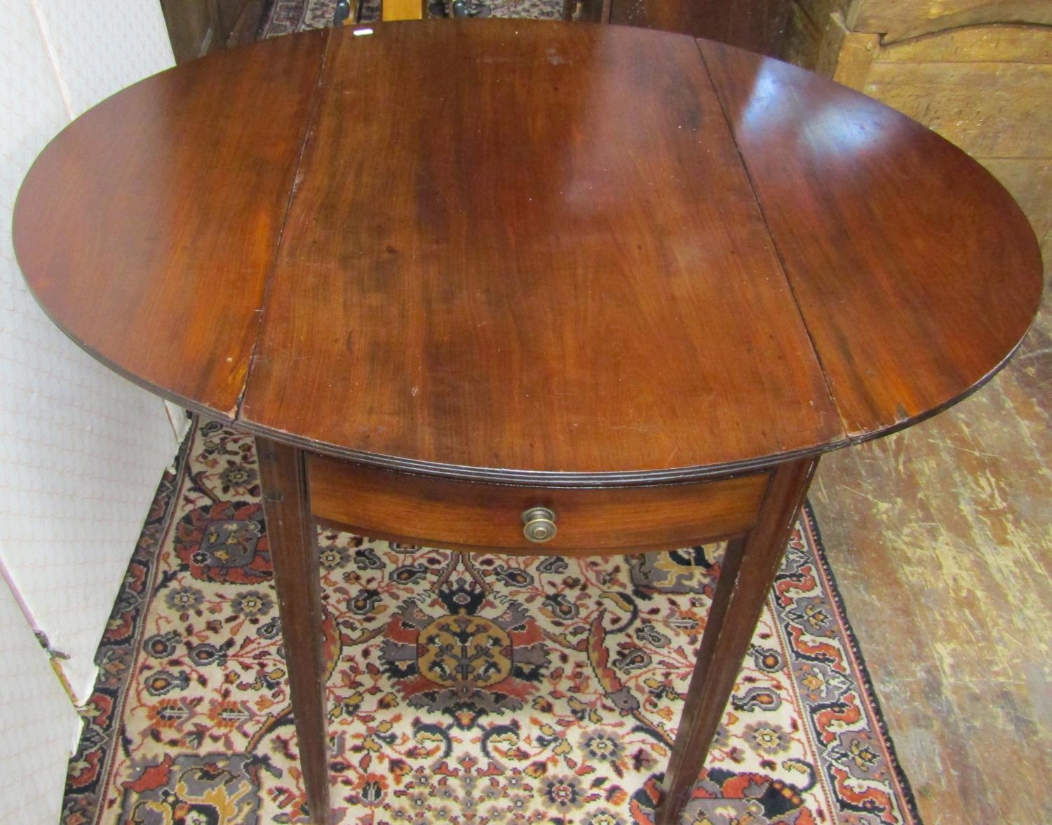 A 19th century mahogany oval Pembroke table with frieze drawer raised on square tapered supports - Image 6 of 7