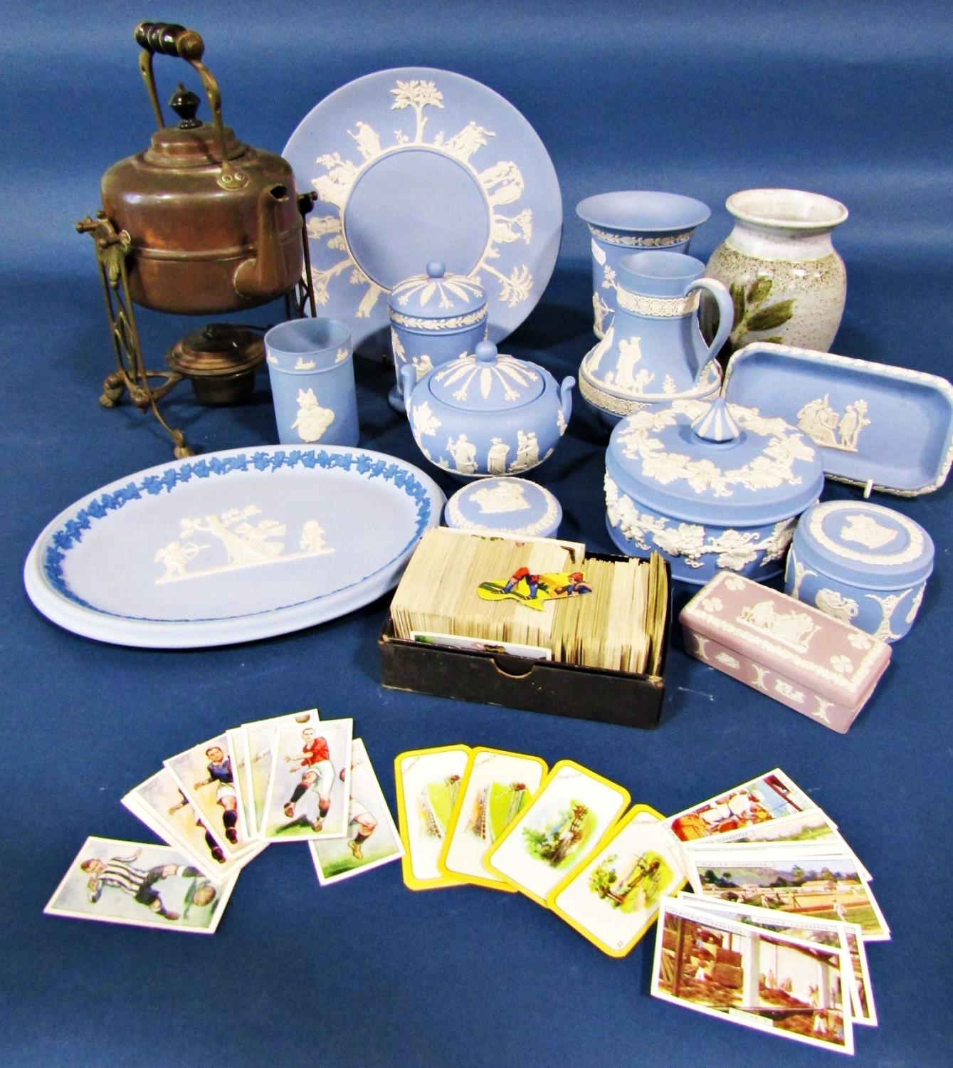 A collection of Wedgwood Blue Jasperware dishes, jugs, bowls, etc, Victorian copper spirit kettle