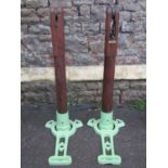 A pair of F A Davis Ltd London vintage lawn tennis posts in oak and cast iron