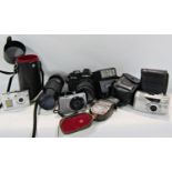 Photographic Equipment - including three pocket cameras, a Minolta, Sony and a Kyocera, a Minolta