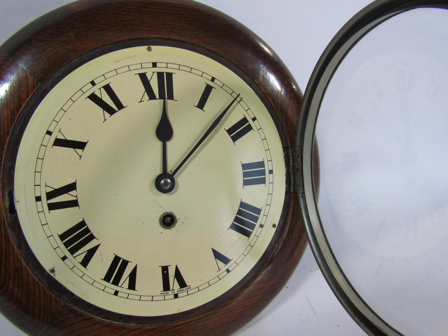 A small dial clock with oak case, chrome bezel and eight day time piece, the dial 19cm diameter - Image 2 of 2