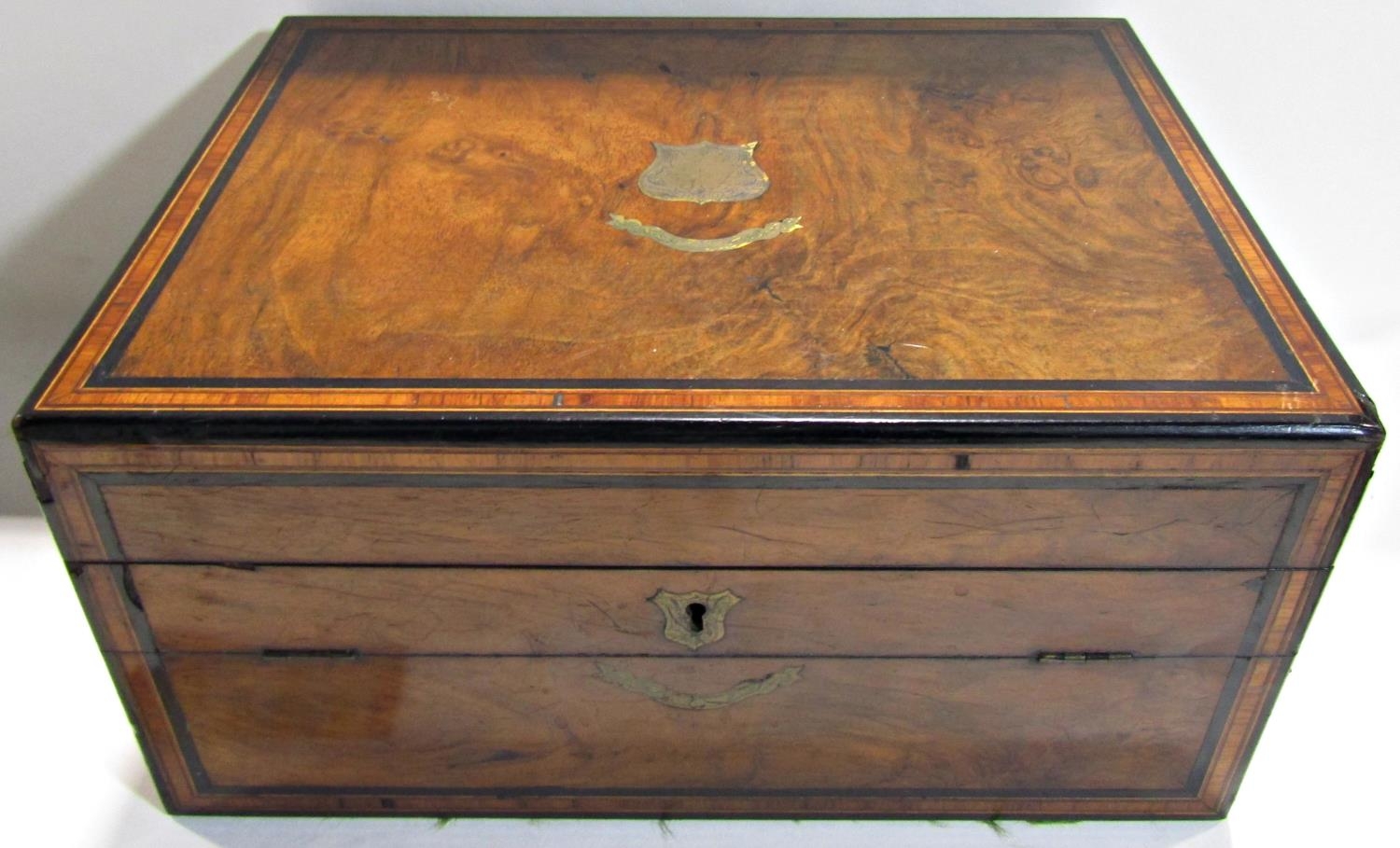 A 19th century walnut, ebony and rosewood strung, writing slope with a hinged front panel and purple