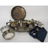 A silver plated oval filigree galleried tray with engraved foliate decoration 22.5cm wide, a