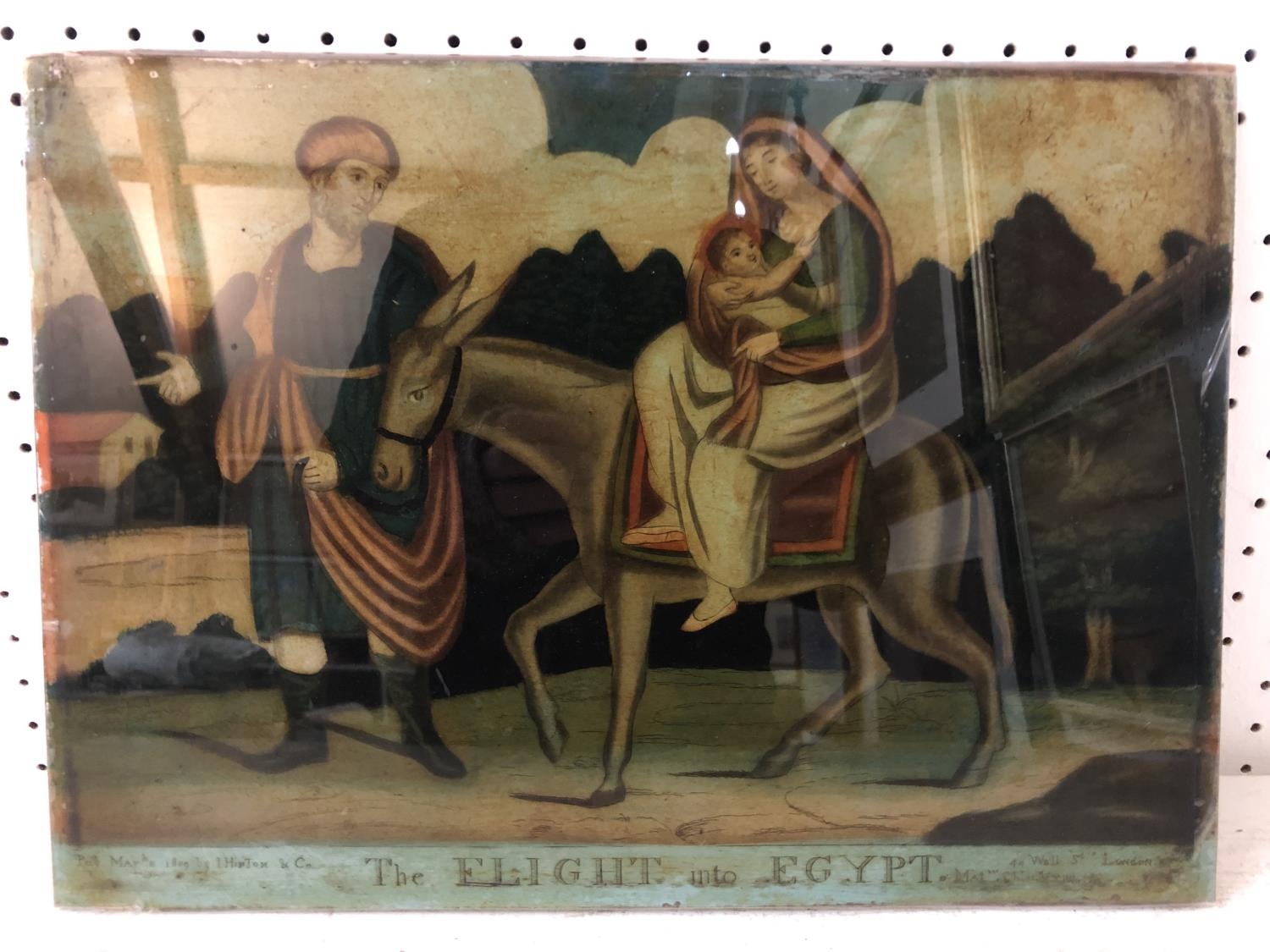 Early 19th century hand-coloured reverse mezzotint on glass: 'The Flight into Egypt' published March