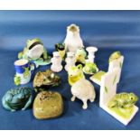 A collection of whimsical frogs presented as bookends, tankards, money boxes, etc, together with a