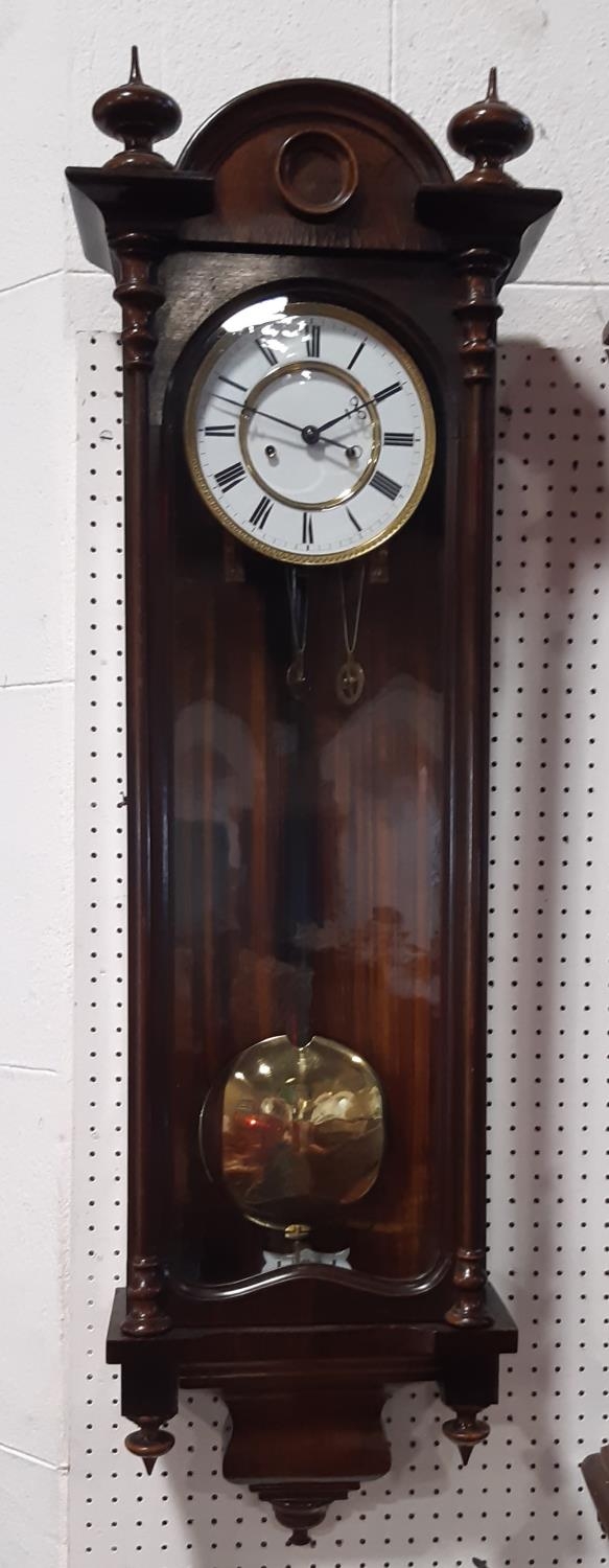 19th century Vienna wall clock with weight driven two train movement within a decorative case