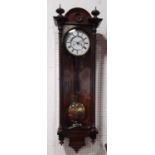 19th century Vienna wall clock with weight driven two train movement within a decorative case