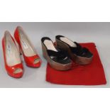 Pair of ladies shoes by Jimmy Choo in red patent leather, with peep toe and stiletto heel, size