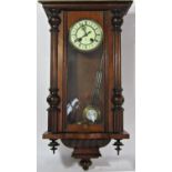 A 19th century Vienna wall clock by Gustav Becker within a decorated case