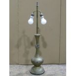 A Chinese cast brass table lamp raised on a circular ebonised base 83 cm (full height)