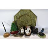 A miscellaneous collection of items including a Christmas tree door stop, bronze effect pair of