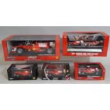 5 boxed models of Formula 1 racing cars by Hot Wheels including 1:18 scale F10 Bahrain GP Edition (