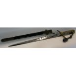 A good George V naval ceremonial short sword, with engraved blade, shark skin grip, lion head