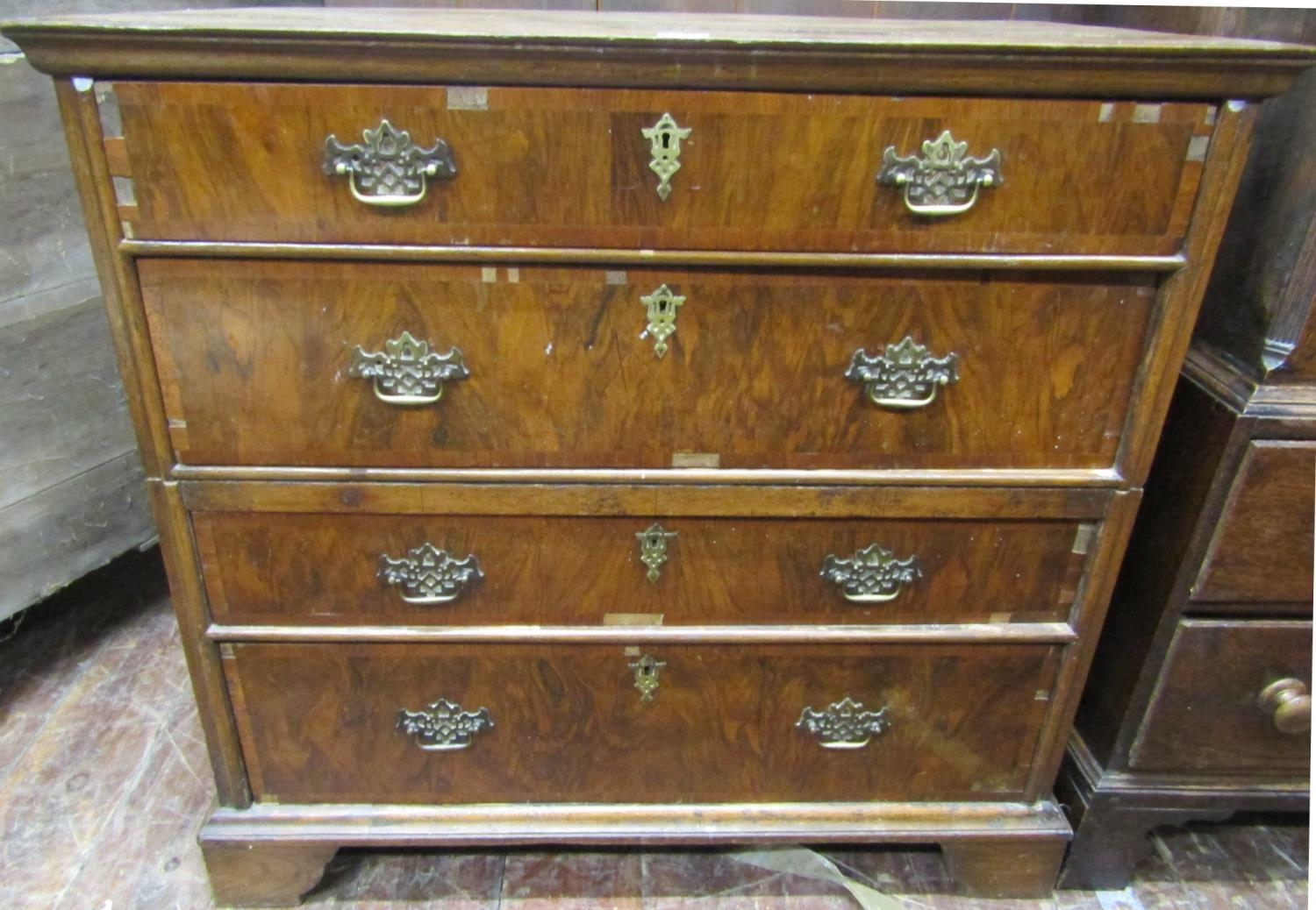 An antique countrymade chest of four long drawers, the carcass in two sections with figured walnut - Image 3 of 5