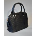 Gucci ladies handbag in black leather 'Microguccissima Mini Dome' unused, with dual handles, zip