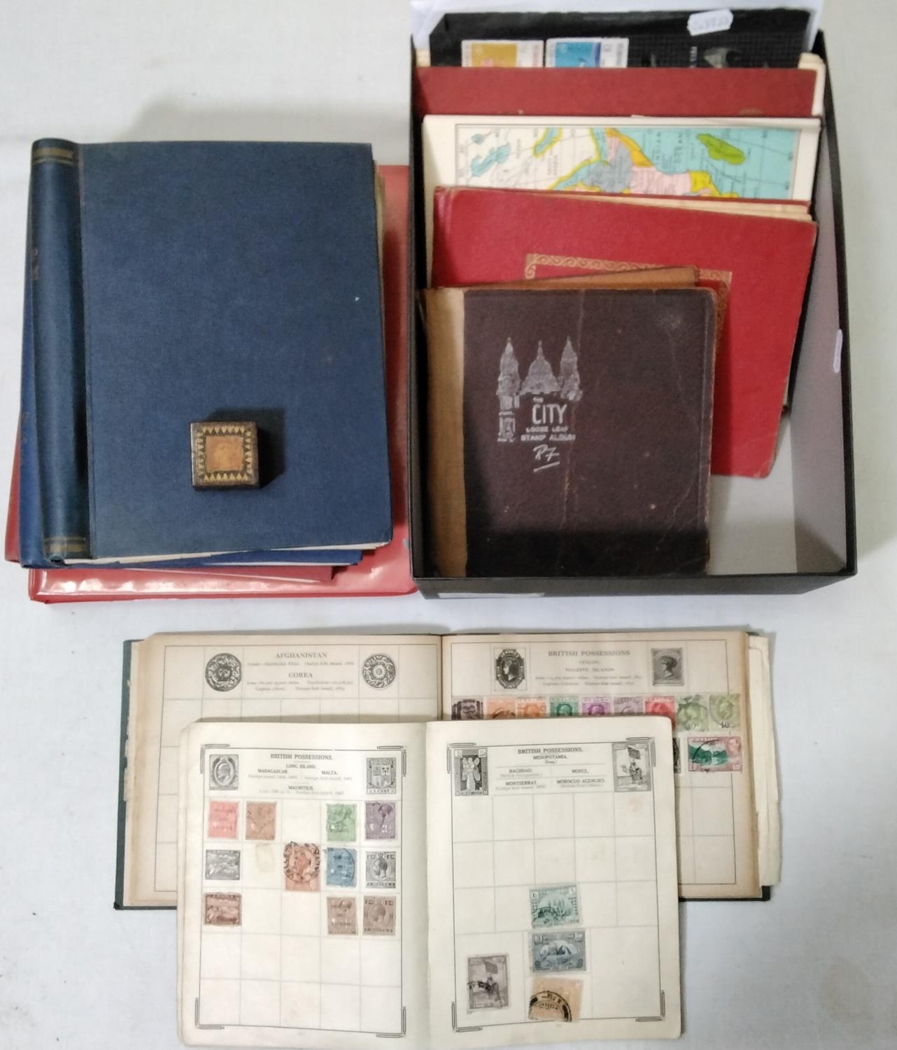 A good collection of British and worldwide stamp albums, part albums, unsorted loose stamps, all