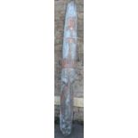 A weathered painted and distressed wooden elongated tribal mask 194 cm x 20 cm