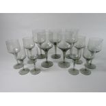 A collection of Orrefors Rhapsody Smoky grey wine glasses, eleven small wines, 17cm tall, five