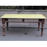 A Victorian stained pine kitchen table base of rectangular form with later top, (af) lacks frieze