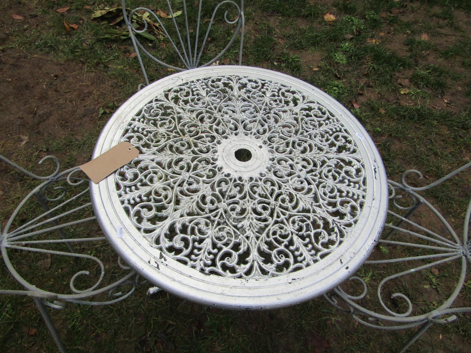 A cast aluminium garden terrace table with pierced scrolling foliate panelled top and swept - Image 2 of 3