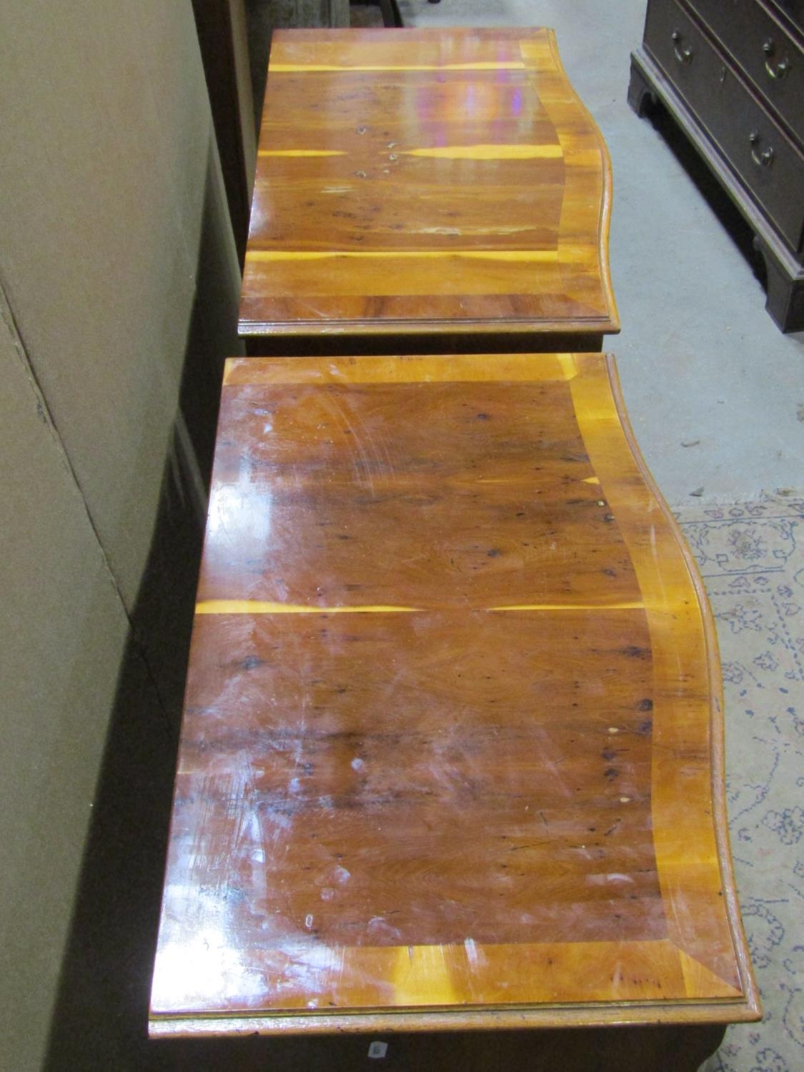 A pair of reproduction Georgian style yew wood veneered four drawer serpentine front chests of - Image 2 of 3