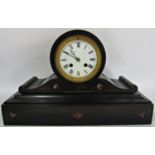 Victorian black slate mantel clock with drum movement, enamel dial and striking action