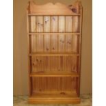 two modern pine freestanding open bookcases one 61cm w x 123cm h x 18cm d the other 93cmw x 26cm d x