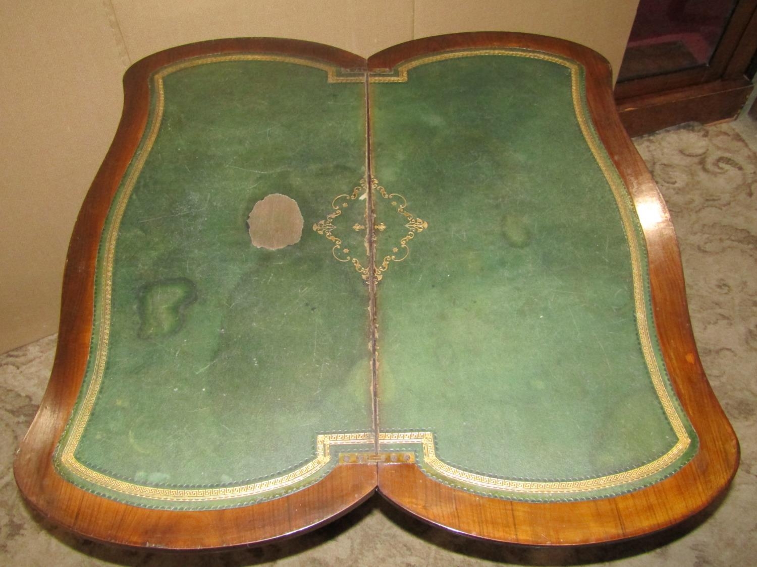 A walnut and figured walnut veneered fold over top card table with serpentine outline, raised on - Image 3 of 4