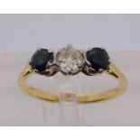 18ct topaz and diamond three stone ring, diamond 0.25cts approx, size M/N, 3.2g