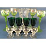 A miscellaneous collection of glassware including decorative floral hock glasses, vases, Georgian