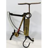 A French brass 19th century counter balance weighing scales with an enamel gram scale 32cm high, and
