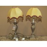 A pair of contemporary Valsan classical style table lamps and domed shades with tassel droplet