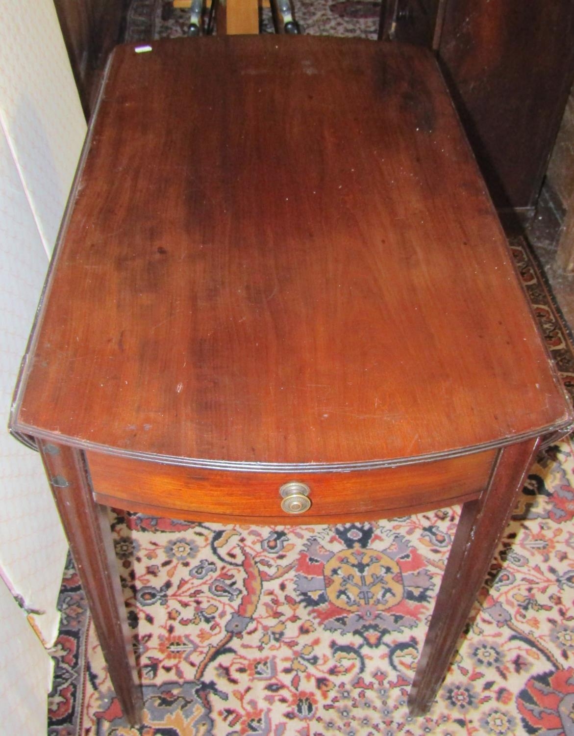 A 19th century mahogany oval Pembroke table with frieze drawer raised on square tapered supports - Image 2 of 7