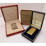 Dunhill gold plated cigarette lighter with engine turned detail, 'C663', in fitted leather case